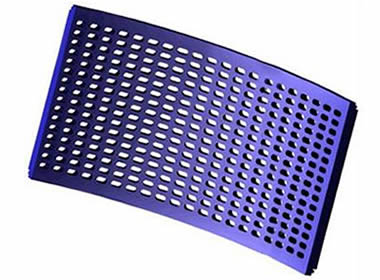 A piece of blue polyurethane trommel screen with oval holes.